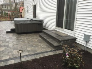 Jacuzzi, Firepit, Outdoor Lighting and patio - Construction by Signature Pool and Spas