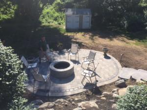 Firepit, path and Outdoor patio - Construction by Signature Pool and Spas