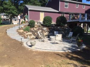 Firepit, path and Outdoor patio - Construction by Signature Pool and Spas