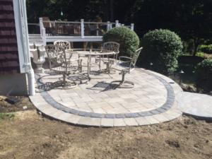 Firepit, path and Outdoor patio - Construction by Signature Pool and Spas